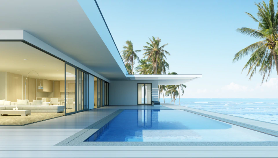a modern minimalist pool by the beach